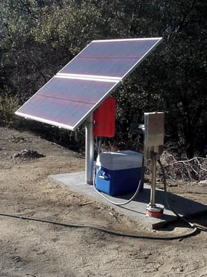 Simple Pump with solar panels at a remote off-grid cabin
