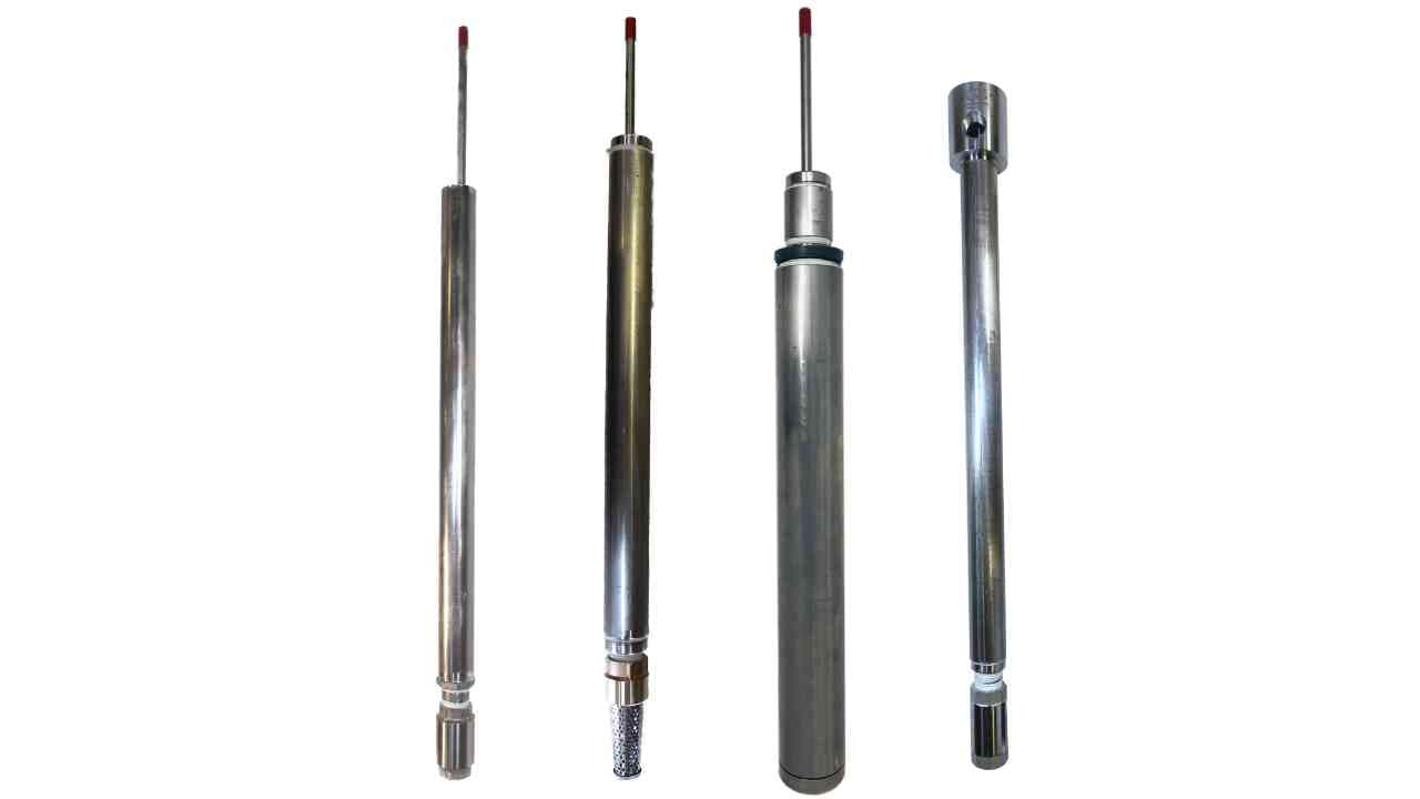 Four different pump cylinder types showing size and configuration differences